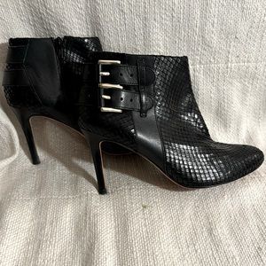 Ann Taylor black leather ankle boots with triple buckles and stiletto heel